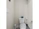 Powder room with simple toilet and fixtures at 1861 Poplar Falls Ave, Lithonia, GA 30058