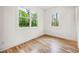 Bright bedroom with hardwood floors and multiple windows providing lots of natural light at 2869 4Th Sw St, Atlanta, GA 30315