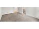 Bedroom with neutral carpeting and a door leading to an attached bathroom at 2869 4Th Sw St, Atlanta, GA 30315