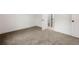 Bedroom with neutral carpet and a door leading to an attached bathroom at 2869 4Th Sw St, Atlanta, GA 30315