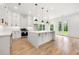 Spacious, bright kitchen featuring a large island, modern appliances, and hardwood flooring at 2869 4Th Sw St, Atlanta, GA 30315