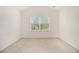 A well-lit bedroom with a window and neutral walls, creating a blank canvas for personalization at 4355 Rainer Dr, Atlanta, GA 30349