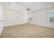 Bright and airy bedroom featuring trey ceiling and plush carpeting at 4355 Rainer Dr, Atlanta, GA 30349