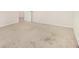 The bedroom features neutral walls, light carpet, and doors leading to other rooms at 4355 Rainer Dr, Atlanta, GA 30349