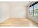 Bright bedroom featuring hardwood floors and a large window, creating a serene and inviting space at 4355 Rainer Dr, Atlanta, GA 30349