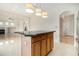 Open-concept kitchen island with granite counters, seamlessly connecting to the living space at 4355 Rainer Dr, Atlanta, GA 30349