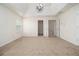 Large bedroom with walk-in closets and bright light fixture at 4355 Rainer Dr, Atlanta, GA 30349