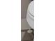 Modern bathroom with sleek design featuring a toilet, tile flooring and white color at 4444 Sullivan Rd, Powder Springs, GA 30127