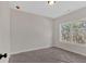 Bright room with a window providing natural light, looking out into trees at 4444 Sullivan Rd, Powder Springs, GA 30127