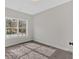 Well-lit bedroom with a large window looking out onto a wooded area at 4444 Sullivan Rd, Powder Springs, GA 30127