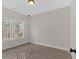 Well-lit room with a window providing natural light, looking out into trees at 4444 Sullivan Rd, Powder Springs, GA 30127