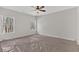 This bedroom has neutral paint, and large windows that fill the space with natural light at 4444 Sullivan Rd, Powder Springs, GA 30127