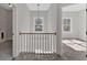 Bright open hallway with natural light coming through the large window at 4444 Sullivan Rd, Powder Springs, GA 30127
