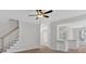 Open layout showing stairway and views of living room area from the Gathering room at 4444 Sullivan Rd, Powder Springs, GA 30127