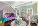 Playful bedroom with bunk beds, natural light, and ample play space at 145 Cuthbert Ln, Acworth, GA 30101
