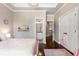 Bright bedroom offers tray ceilings, and bathroom access at 145 Cuthbert Ln, Acworth, GA 30101
