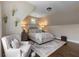 Serene bedroom with warm tones, a sitting area, and hardwood floors at 145 Cuthbert Ln, Acworth, GA 30101