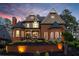 Stunning brick home with manicured landscaping and beautiful architectural details at 145 Cuthbert Ln, Acworth, GA 30101