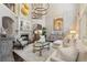 Elegant living room featuring a fireplace, high ceilings, and sophisticated decor at 145 Cuthbert Ln, Acworth, GA 30101