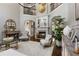 Spacious living room with a fireplace, high ceilings, and stylish decor at 145 Cuthbert Ln, Acworth, GA 30101