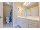 Bathroom features white vanity, tile floor, and a separate toilet and shower area at 2121 Rock Court, Loganville, GA 30052