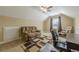 Upstairs bonus room with comfortable seating, carpet flooring, and natural light at 2121 Rock Court, Loganville, GA 30052