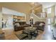 Bright and airy living room with hardwood floors, staircase, and comfortable seating area at 2121 Rock Court, Loganville, GA 30052