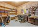A functional home office space with rustic wood paneling and built-in shelving at 2121 Rock Court, Loganville, GA 30052