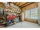 Well-organized storage room with ample shelving and a window providing natural light at 2121 Rock Court, Loganville, GA 30052