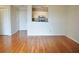 Bright living room showcasing wood floors and an open view into the kitchen at 970 Sidney Marcus Ne Blvd # 2203, Atlanta, GA 30324
