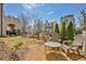 Secluded backyard featuring a gravel patio and seating area, perfect for relaxation at 165 2Nd St, Fayetteville, GA 30214