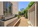 Backyard featuring a patio, gravel, gardens, fence, and bench at 165 2Nd St, Fayetteville, GA 30214