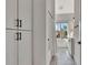 Hallway leading into bathroom with tub and shower combo at 165 2Nd St, Fayetteville, GA 30214