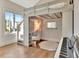 Stylish bedroom featuring a built-in loft bed, desk area, and a keyboard on wood floors at 165 2Nd St, Fayetteville, GA 30214
