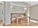 Charming dining nook featuring a wooden bench and elegant brick accents at 165 2Nd St, Fayetteville, GA 30214