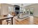 Inviting living room with fireplace, hardwood floors, and comfortable seating at 165 2Nd St, Fayetteville, GA 30214