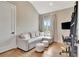 Bright sitting room with view to the outside at 165 2Nd St, Fayetteville, GA 30214