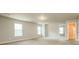 Open bedroom featuring two windows offering plenty of natural light and a closet at 245 Astoria Way, Mcdonough, GA 30253
