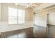 Elegant dining room featuring decorative molding, chandelier, and large window for ample natural light at 245 Astoria Way, Mcdonough, GA 30253