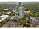 Beautiful aerial view of apartment buildings surrounded by lush trees and foilage in a thriving residential area at 2870 Pharr Court South Nw # 504, Atlanta, GA 30305