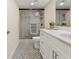Modern bathroom featuring a sleek glass shower and updated vanity at 2870 Pharr Court South Nw # 504, Atlanta, GA 30305