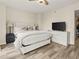 Comfortable bedroom features a queen-sized bed, stylish decor, and ample natural light at 2870 Pharr Court South Nw # 504, Atlanta, GA 30305
