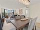 Open floor plan showing living and dining areas with modern furnishings and natural lighting at 2870 Pharr Court South Nw # 504, Atlanta, GA 30305