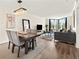 Bright living room featuring modern furniture, wood floors, and large windows with natural light at 2870 Pharr Court South Nw # 504, Atlanta, GA 30305