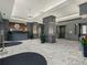 Elegant lobby area with marble floors, stylish lighting, and a staffed reception desk at 2870 Pharr Court South Nw # 504, Atlanta, GA 30305