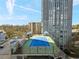 Rooftop tennis court offering recreational opportunities and city views at 2870 Pharr Court South Nw # 504, Atlanta, GA 30305