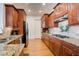 Traditional kitchen featuring granite countertops, stainless steel appliances, and hardwood floors at 4124 Hunt St, Covington, GA 30014