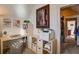 Organized office area with a built-in desk, neutral tones, and ample natural light at 4124 Hunt St, Covington, GA 30014