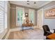 Cozy office space with neutral walls, plantation shutters, and natural light at 4124 Hunt St, Covington, GA 30014