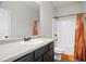 Bathroom featuring a single sink vanity, a toilet, and a shower/tub combo at 4133 Shoals Ln, Union City, GA 30291